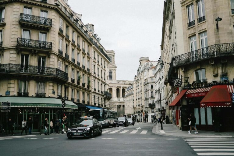 street scene in Paris France showing local life, cafes, and architecture – representing daily life in Paris